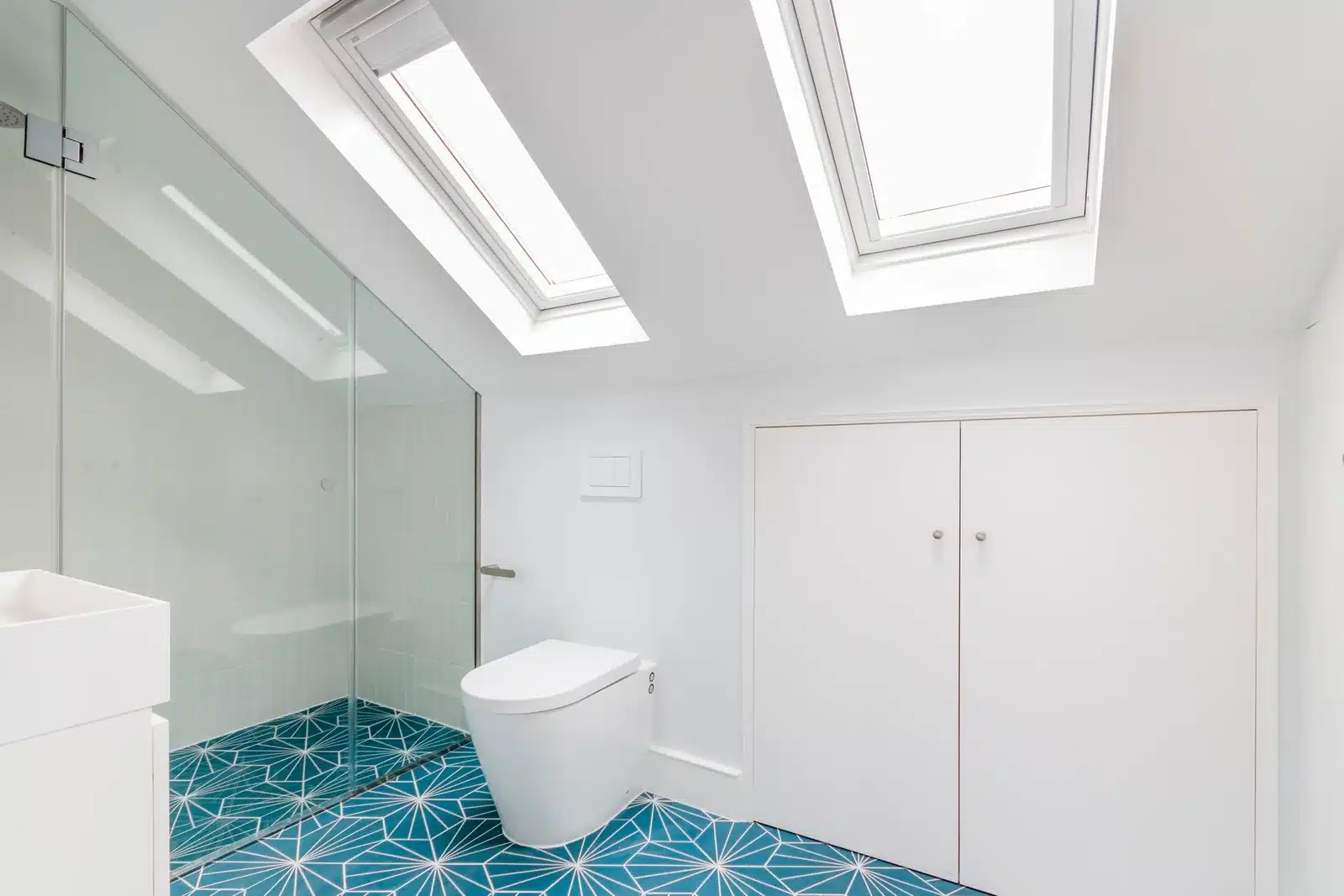 Loft en-suite shower room with two rooflights, Wimbledon