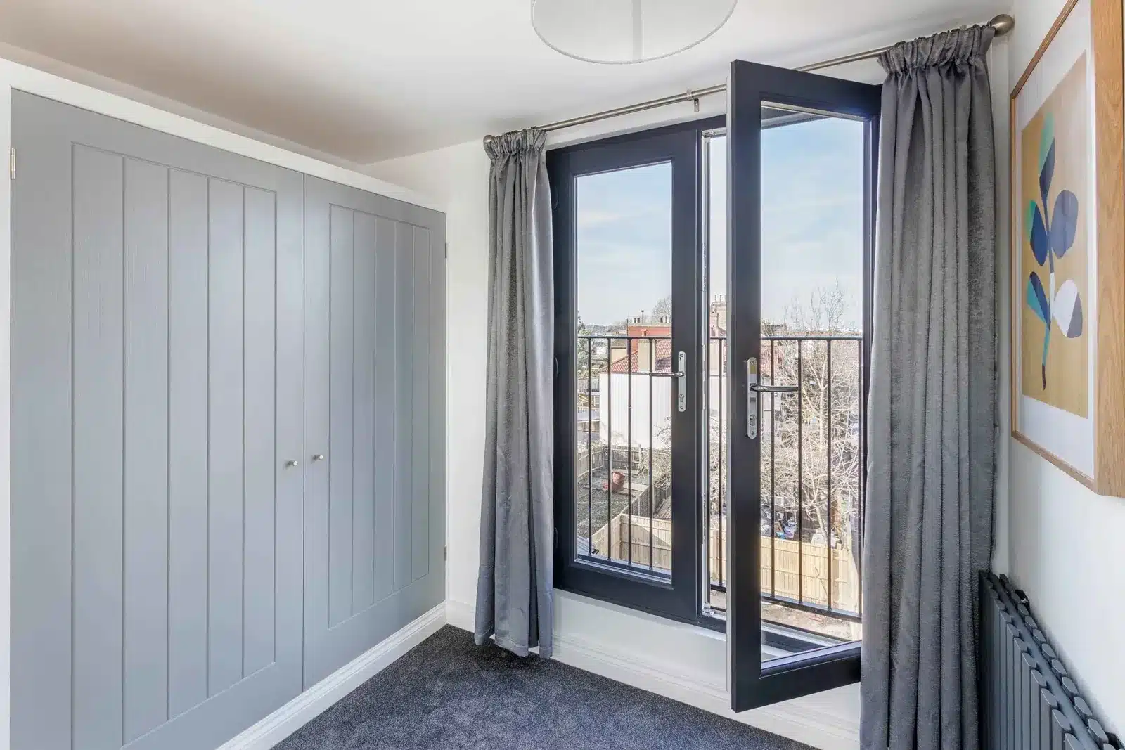 Glazed doors with a Juliet balcony at Devonshire, Colliers Wood, SW London